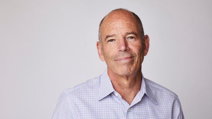 closeup of man wearing white shirt