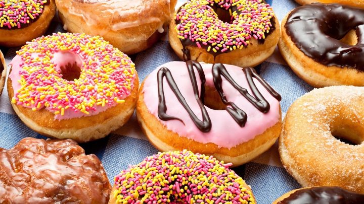 Close up of a selection of colorful donuts.