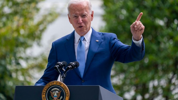 biden speaks at lectern about stimulus checks