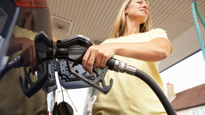 woman pumping gas