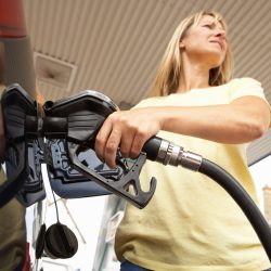 woman pumping gas