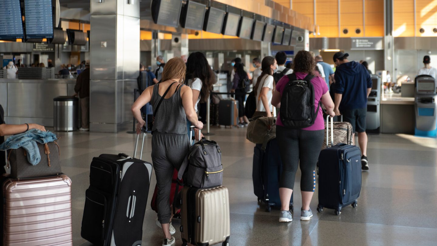 memorial day travel airport passenger line