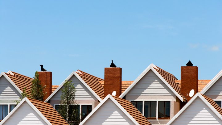 row of houses with roofs shown