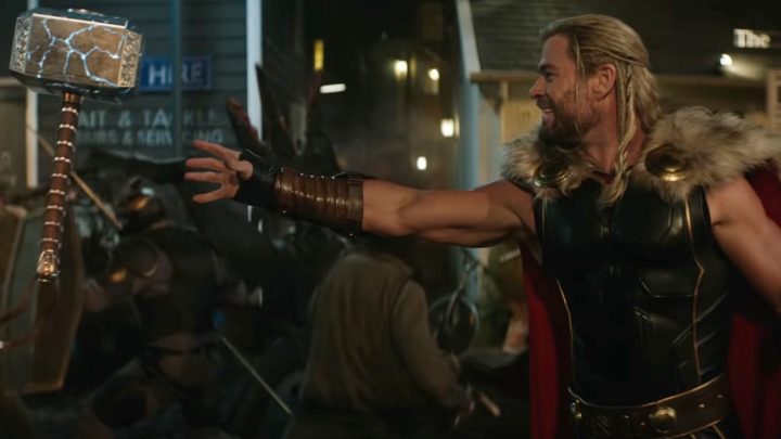 A surprised and excited Thor (Chris Hemsworth) foolishly believing he can get Mjolnir back.